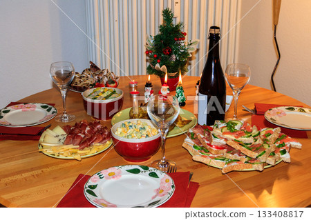 Christmas dinner set on a wooden table 133408817