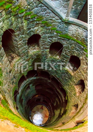 Initiation Well (Inverted tower) at park of Quinta da Regaleira palace in Sintra, Portugal Initiation Well (Inverted tower) at park of Quinta da Regaleira palace in Sintra, Portugal 133408838