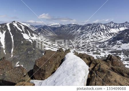 Scenic snowy landscape of Leirvassbu in Leirdalen showcasing the beauty of Jotunheimen National Park 133409088