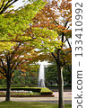 Autumn park and fountain 133410992