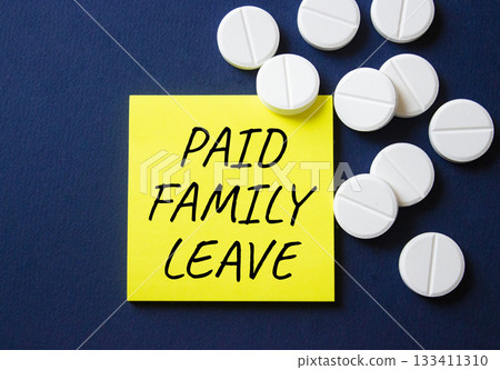 Paid Family Leave symbol. Concept words Paid Family Leave on yellow note. Beautiful deep blue background with pills. Healthcare and Paid Family Leave concept. Copy space. Paid Family Leave symbol. Concept words Paid Family Leave on yellow note. Beautiful deep blue background with pills. Healthcare and Paid Family Leave concept. Copy space. 133411310