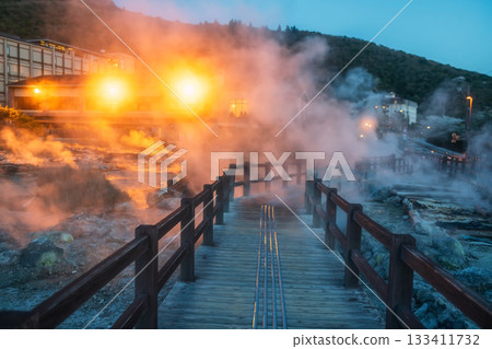 trail by Mt. Unzen Hell valley Jigoku with sulfur gas at night trail by Mt. Unzen Hell valley Jigoku with sulfur gas at night 133411732