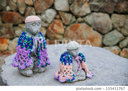 Monkey statues with scarf cloth in winter at Ryuanji temple, Osaka Monkey statues with scarf cloth in winter at Ryuanji temple, Osaka 133411767