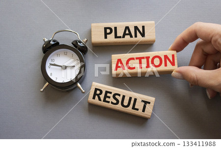 Plan Action Result symbol. Concept words Plan Action Result on wooden blocks. Businessman hand. Beautiful grey background with alarm clock. Business concept and Plan Action Result. Copy space. Plan Action Result symbol. Concept words Plan Action Result on wooden blocks. Businessman hand. Beautiful grey background with alarm clock. Business concept and Plan Action Result. Copy space. 133411988