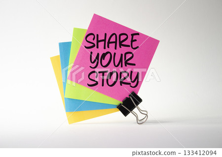 Share your story symbol. Sticky notes with words Share your story. Beautiful white background. Business and Share your story concept. Copy space. Share your story symbol. Sticky notes with words Share your story. Beautiful white background. Business and Share your story concept. Copy space. 133412094