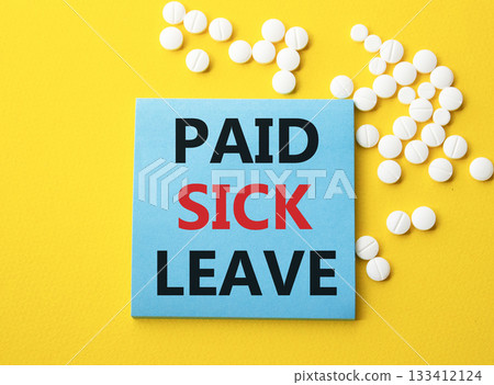 Paid Sick Leave symbol. Concept words Paid Sick Leave on blue note. Beautiful yellow background with pills. Healthcare and Paid Sick Leave concept. Copy space. Paid Sick Leave symbol. Concept words Paid Sick Leave on blue note. Beautiful yellow background with pills. Healthcare and Paid Sick Leave concept. Copy space. 133412124
