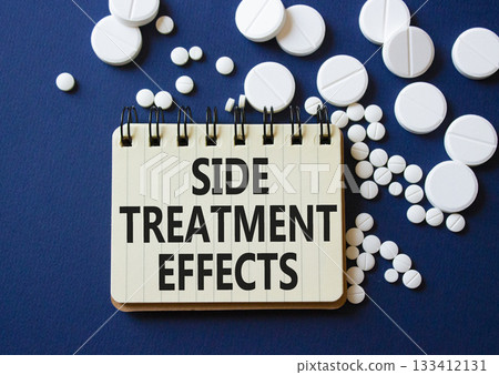 Side Treatment Effects symbol. Concept words Side Treatment Effects on notebook. Beautiful deep blue background with pills. Healthcare and Side Treatment Effects concept. Copy space. Side Treatment Effects symbol. Concept words Side Treatment Effects on notebook. Beautiful deep blue background with pills. Healthcare and Side Treatment Effects concept. Copy space. 133412131