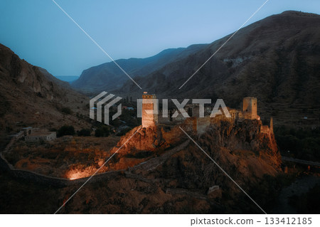 Khertvisi fortress perched on hill with stunning aerial view in mountainous landscape 133412185
