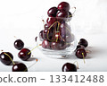 Sweet ripe cherries in  glass bowl around white background 133412488