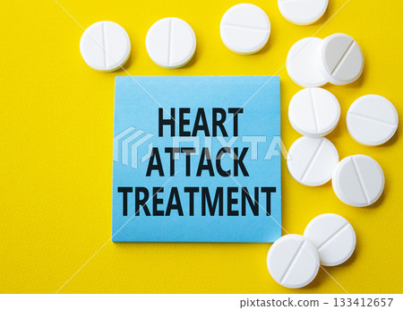 Heart Attack Treatment symbol. Concept word Heart Attack Treatment on blue note. Beautiful yellow background with pills. Medicine and Heart Attack Treatment concept. Copy space Heart Attack Treatment symbol. Concept word Heart Attack Treatment on blue note. Beautiful yellow background with pills. Medicine and Heart Attack Treatment concept. Copy space 133412657