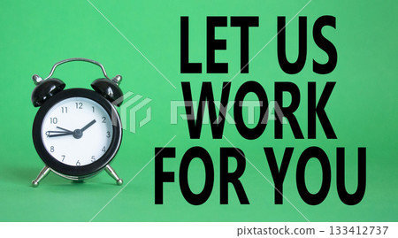Let us work for you symbol. Beautiful green background with alarm clock. Business and Let us work for you concept. Copy space. 133412737
