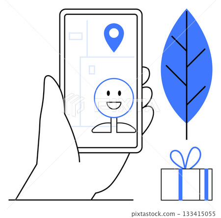 Hand holding smartphone displaying smiling face with location icon on screen. Nearby leaf and gift box. Ideal for navigation apps, social media, technology, communication, environment, gifting. Line 133415055