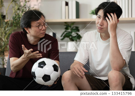 Friends Sharing Thoughts on Soccer Game 133415796