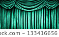 Green velvet theater curtain with dramatic folds 133416656