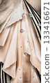 Vertical peach draped fabric with glittering jewels and stripes 133416671