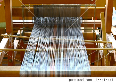 A scene from Tsumugi weaving, a traditional Japanese craft 133416751