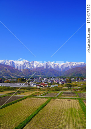 Three-tiered autumn leaves seen from Hakuba Village in autumn Three-tiered autumn leaves seen from Hakuba Village in autumn 133417232