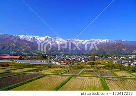 Three-tiered autumn leaves seen from Hakuba Village in autumn Three-tiered autumn leaves seen from Hakuba Village in autumn 133417233
