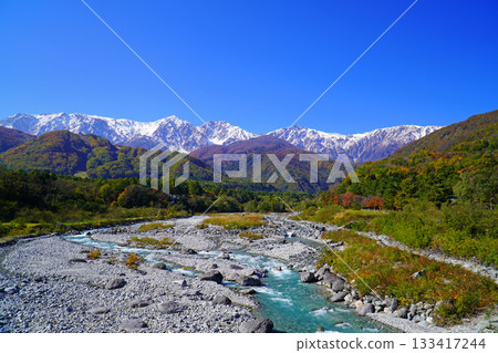 Three-tiered autumn leaves seen from Hakuba Village in autumn 133417244