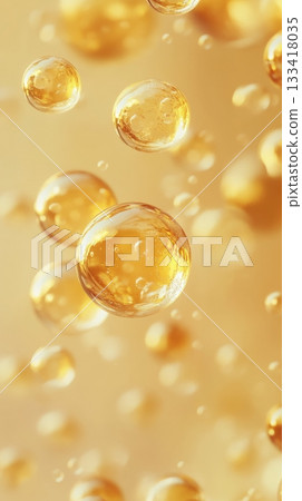Golden oil bubbles floating with soft focus, abstract background. wellness and beauty concept Golden oil bubbles floating with soft focus, abstract background. wellness and beauty concept 133418035