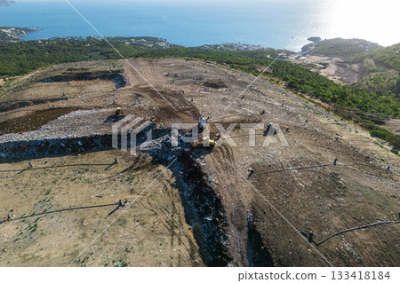Aerial view of waste disposal on the seacoast. Aerial view of waste disposal on the seacoast. 133418184