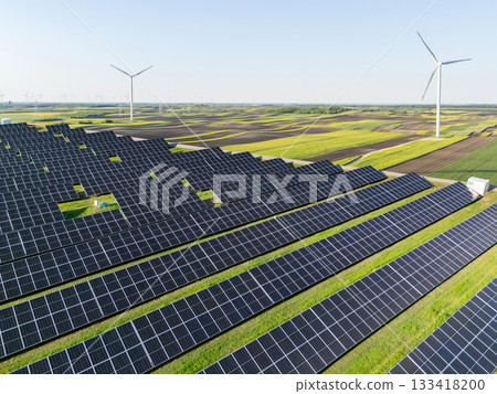 Solar panels and wind turbines. Sustainable energy.. 133418200