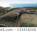 Aerial view of waste disposal on the seacoast 133418208
