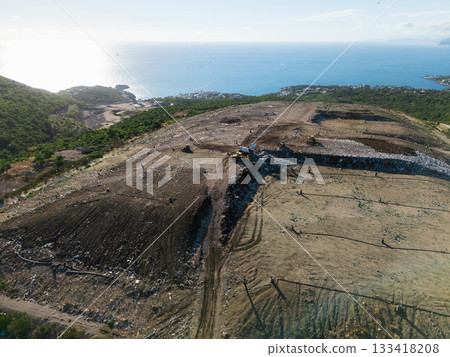 Aerial view of waste disposal on the seacoast 133418208