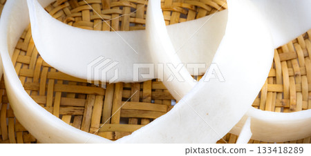 Radish skins on a colander Radish skins on a colander 133418289