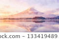Upside-down Mt. Fuji reflected in a lake at dawn - AI-generated 133419489