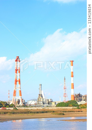 A view of a petrochemical complex with many factory facilities in Yokkaichi City, Mie Prefecture A view of a petrochemical complex with many factory facilities in Yokkaichi City, Mie Prefecture 133419834