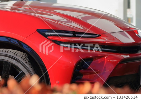 Red domestic sports car 133420514