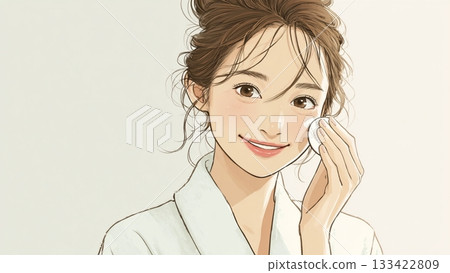 一位身穿浴袍的女士正在進行皮膚護理 133422809