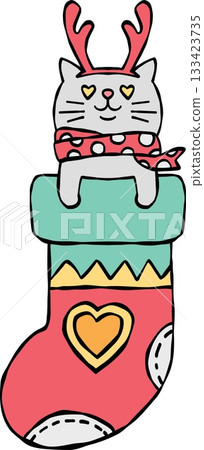 christmas Cute cat in a Christmas stocking with reindeer antlers. 133423735