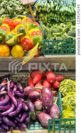 A colorful assortment of fresh vegetables is arranged for sale, showcasing the variety of healthy eating choices available 133424144