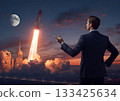 Businessman and rocket looking to the future 133425634