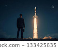 Businessman and rocket looking to the future 133425635