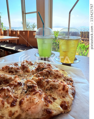 Freshly baked and delicious rice flour pizza with green tea and gold tea 133425797