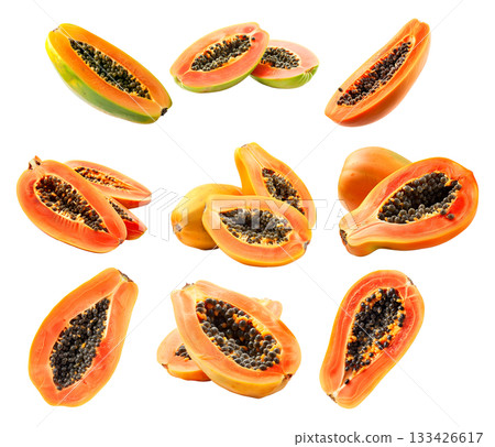 Papaya sliced open, revealing its black seeds isolated on a white transparent background. Concept of tropical fruit 133426617