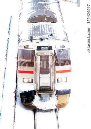 A train arrives at Minami-Otaru Station in Otaru, Hokkaido, mid-winter 133429067