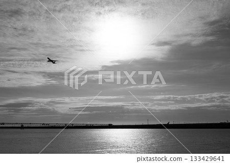 Airplanes illuminated by the morning sun, Haneda Airport, Keihinjima Airplanes illuminated by the morning sun, Haneda Airport, Keihinjima 133429641