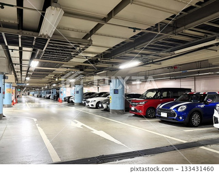Underground parking lot and cars parked there Underground parking lot and cars parked there 133431460