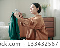 A woman using a flea market app 133432567