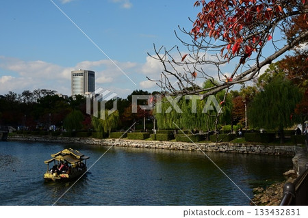 A river flowing under autumn leaves A river flowing under autumn leaves 133432831