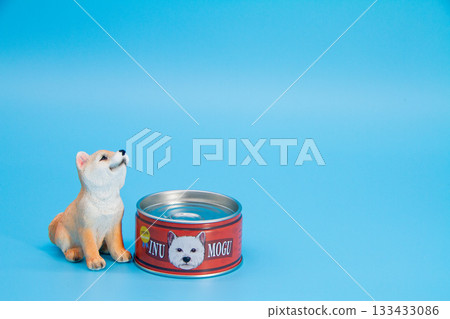 Puppy figurine and canned dog food figurine 133433086