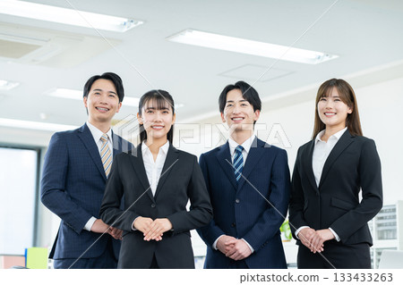 A young businessman working in the office 133433263
