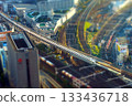 Miniature diorama-style photo of a Shinkansen heading to Nagoya Station seen from the Sky Promenade 133436718