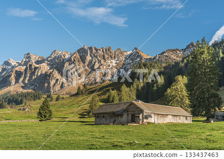 Alpstein mountains with Saentis peak and wooden hut, Canton of St. Gallen, Switzerland Alpstein mountains with Saentis peak and wooden hut, Canton of St. Gallen, Switzerland 133437463