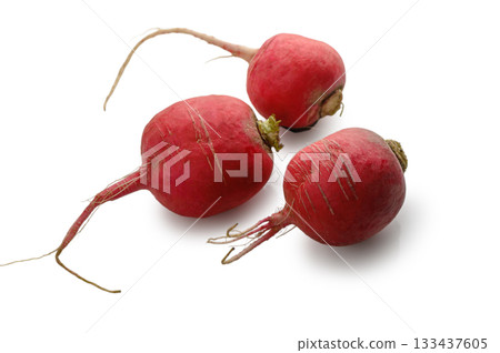 Three red radishes on white background 133437605