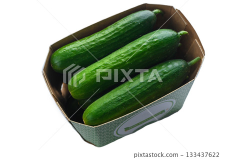 Mini cucumbers for sale in cardboard box on white background Mini cucumbers for sale in cardboard box on white background 133437622